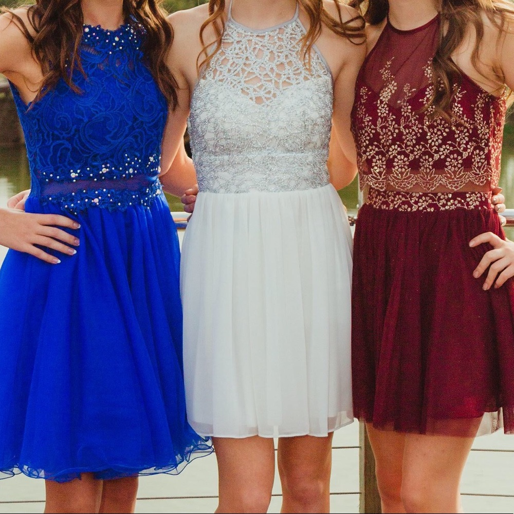 White homecoming dress with silver rhinestones.